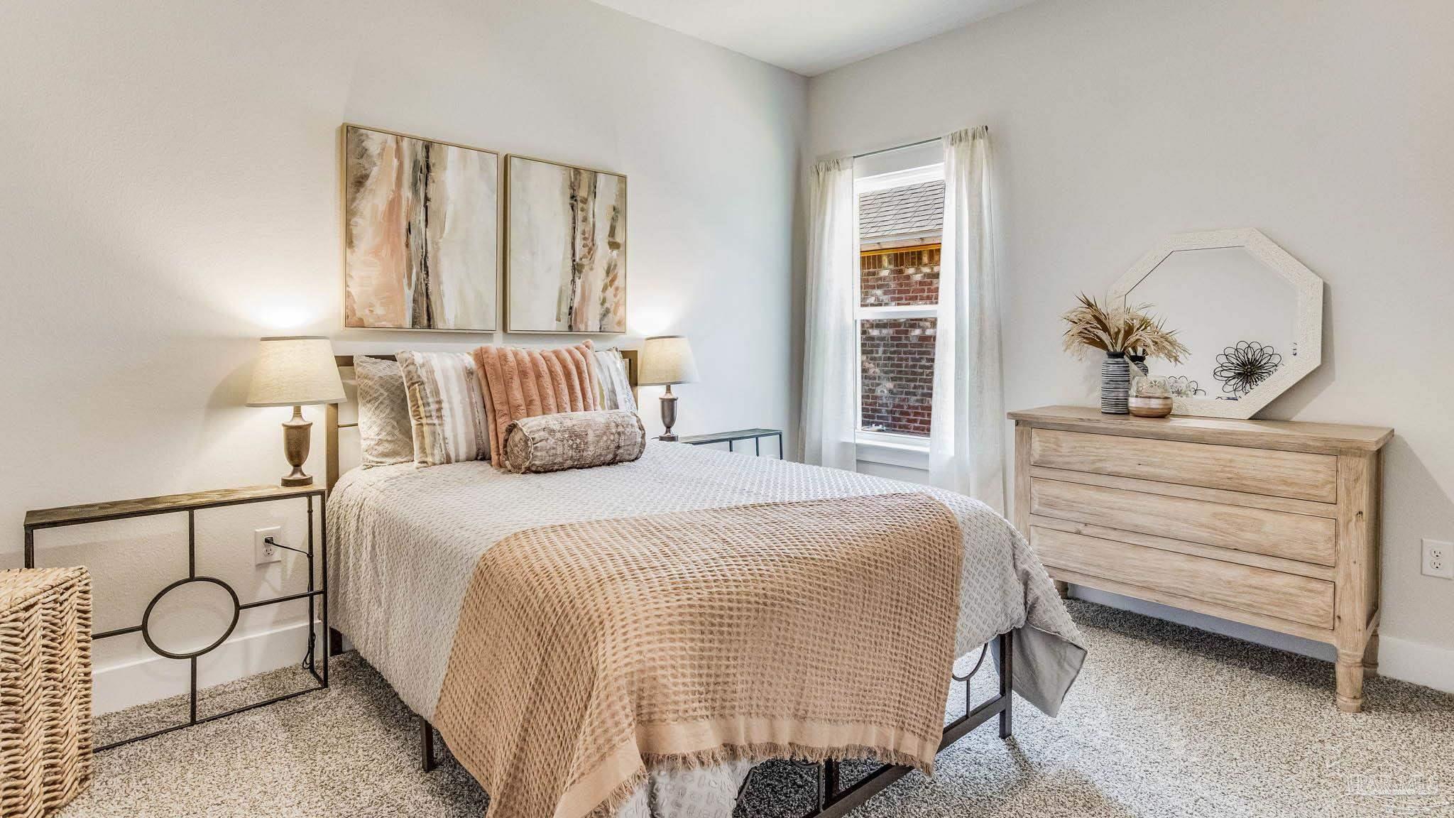 5856 Dove Nest Road Gulf Breeze, FL 32563 - Photo 32 of 33 a bedroom with a bed and window