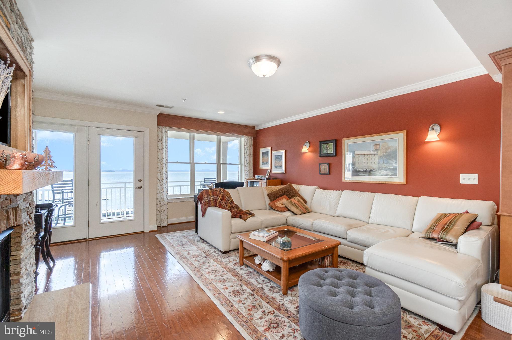 605 Concord Street, Unit 3E Havre de Grace, MD 21078 - Photo 9 of 59 a living room with furniture and a wooden floor