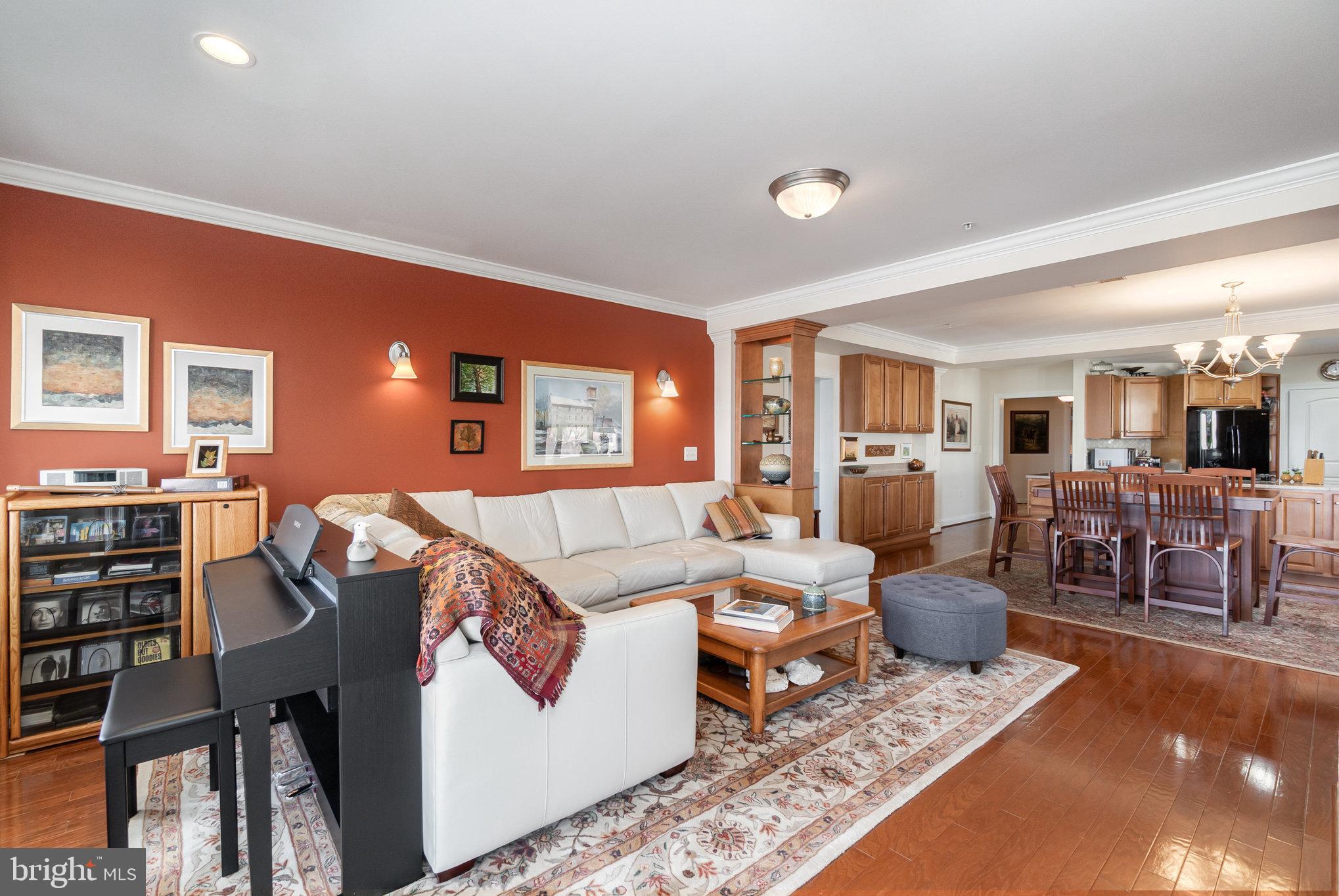 605 Concord Street, Unit 3E Havre de Grace, MD 21078 - Photo 10 of 59 a living room with furniture a rug and a table