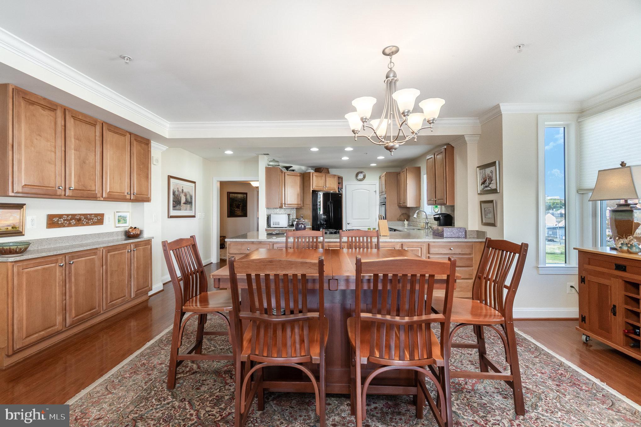 605 Concord Street, Unit 3E Havre de Grace, MD 21078 - Photo 11 of 59 a view of a dining room with furniture and wooden floor