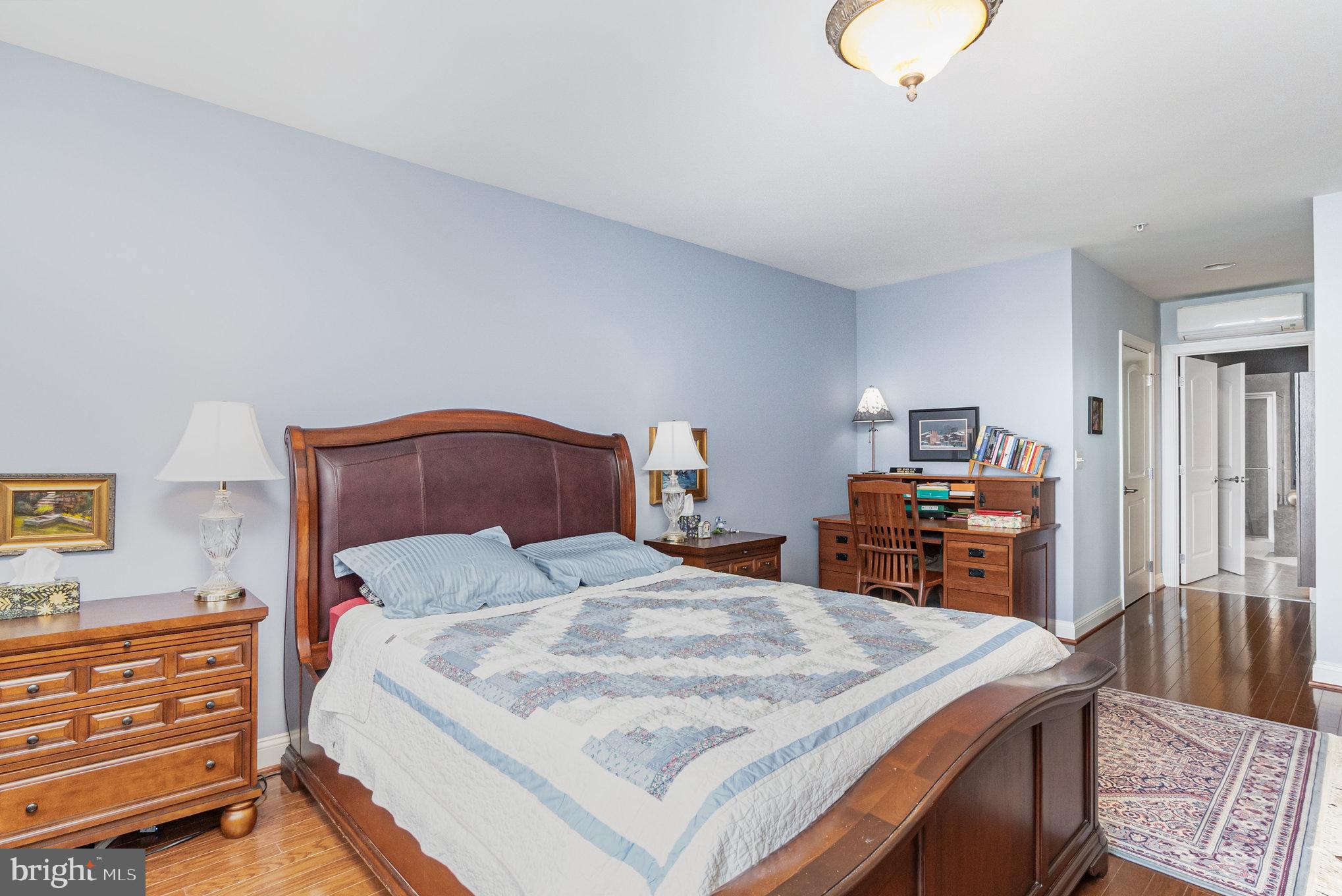 605 Concord Street, Unit 3E Havre de Grace, MD 21078 - Photo 20 of 59 a bedroom with a bed and a dresser in it
