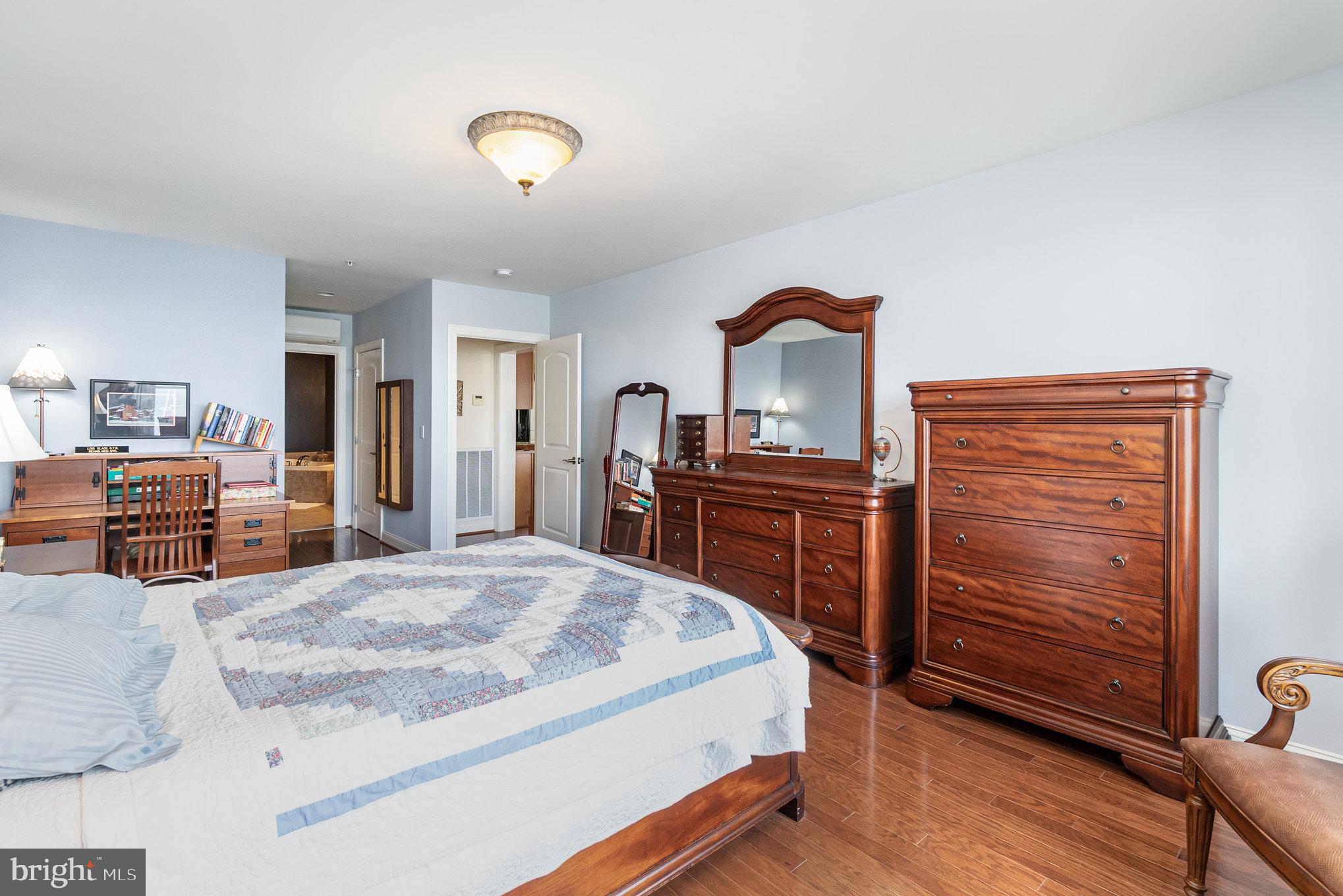 605 Concord Street, Unit 3E Havre de Grace, MD 21078 - Photo 21 of 59 a bedroom with a bed and a dresser