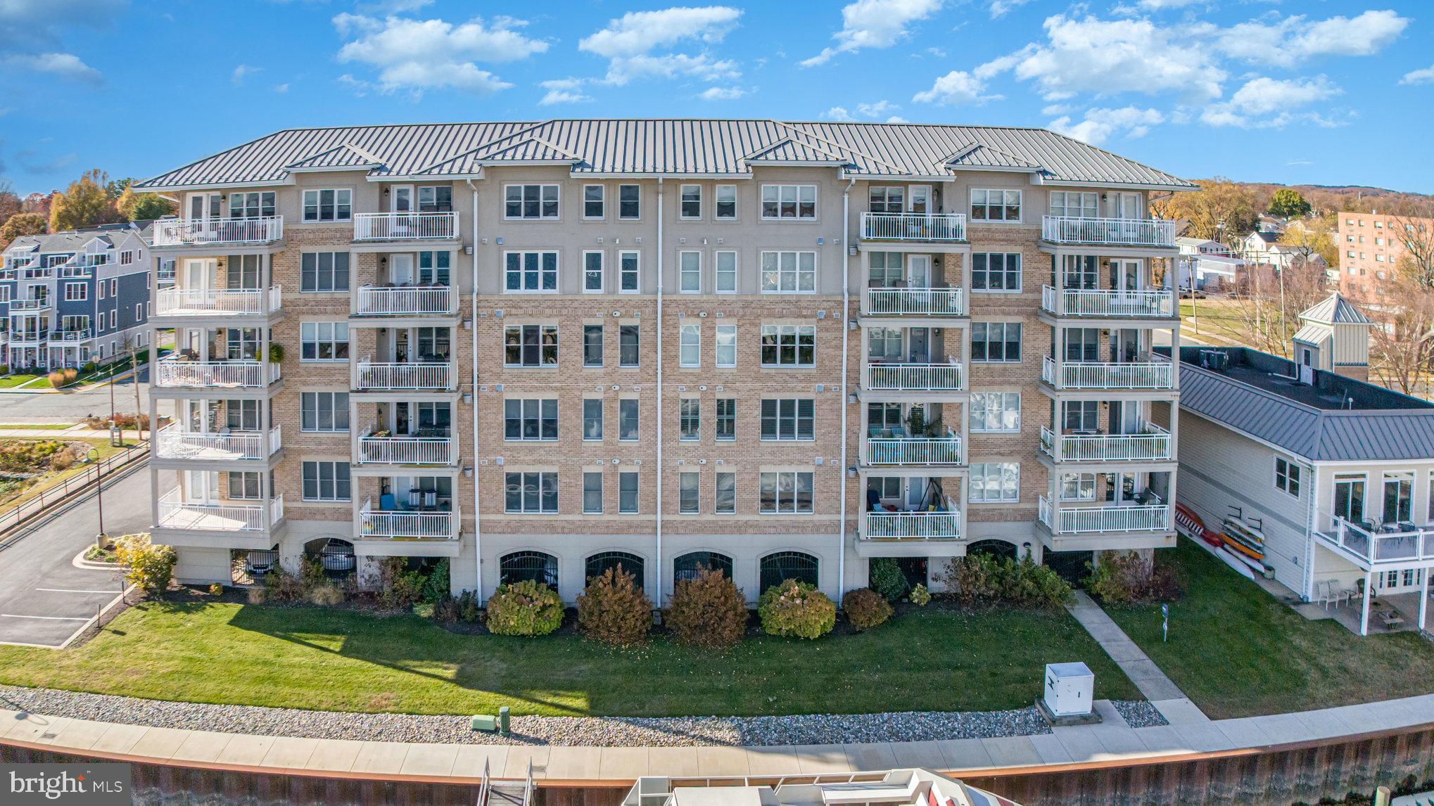 605 Concord Street, Unit 3E Havre de Grace, MD 21078 - Photo 42 of 59 a view of a building with a yard