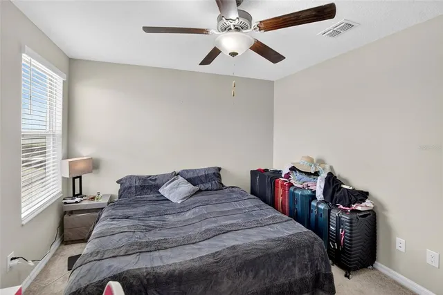 a view of a back yard of a house