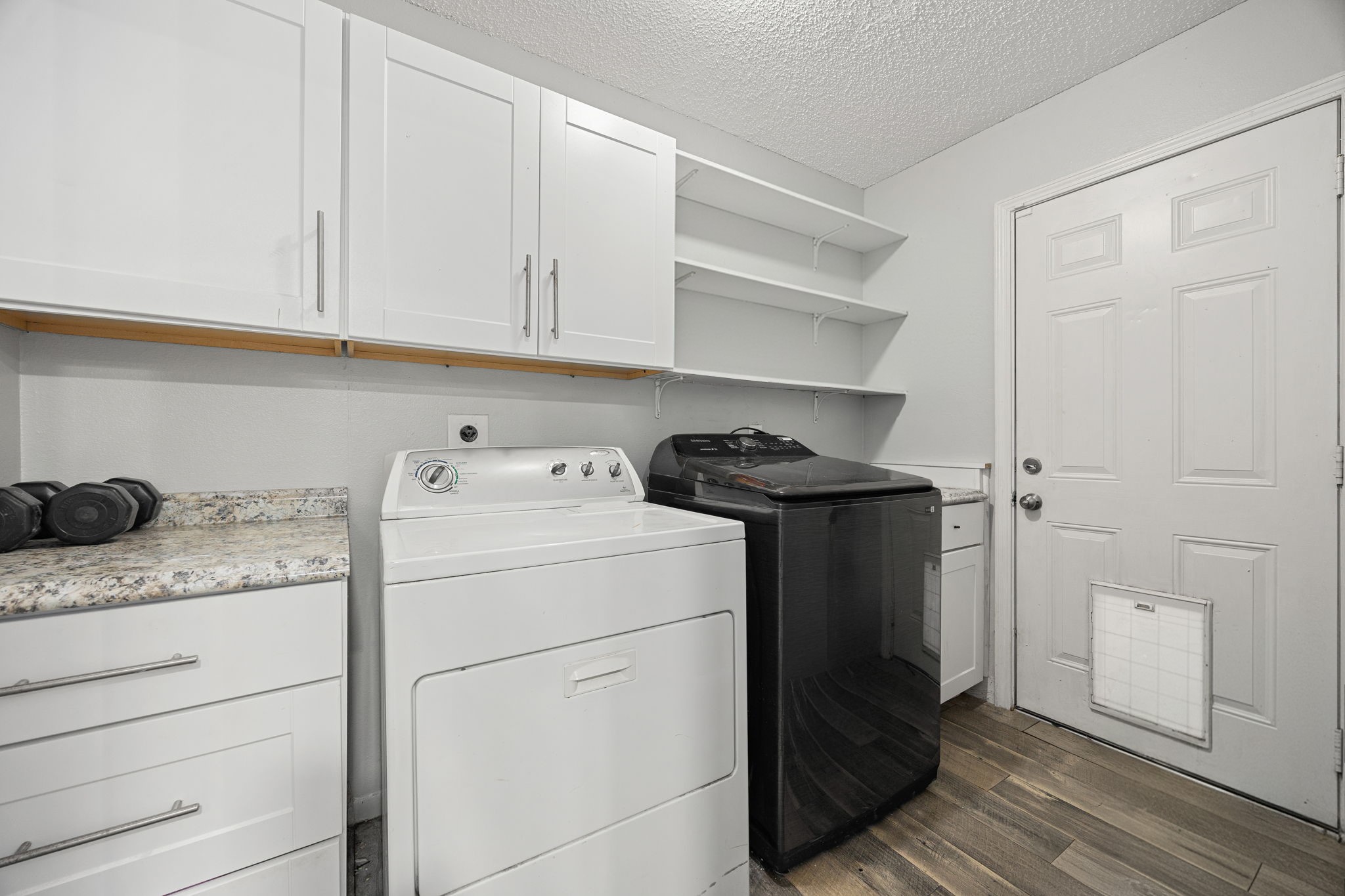 9907 Gold Cup Way Houston, TX 77065 - Photo 16 of 39 a utility room with dryer and washer