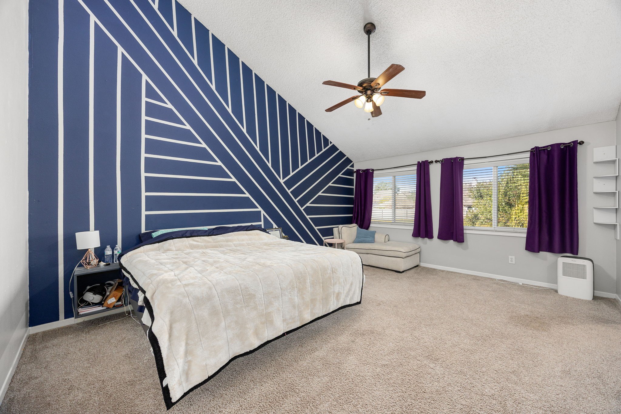 9907 Gold Cup Way Houston, TX 77065 - Photo 19 of 39 a living room with furniture and a chandelier