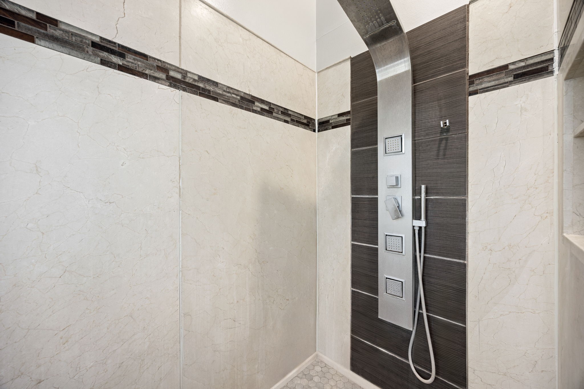 9907 Gold Cup Way Houston, TX 77065 - Photo 22 of 39 a bathroom with a shower and a glass door