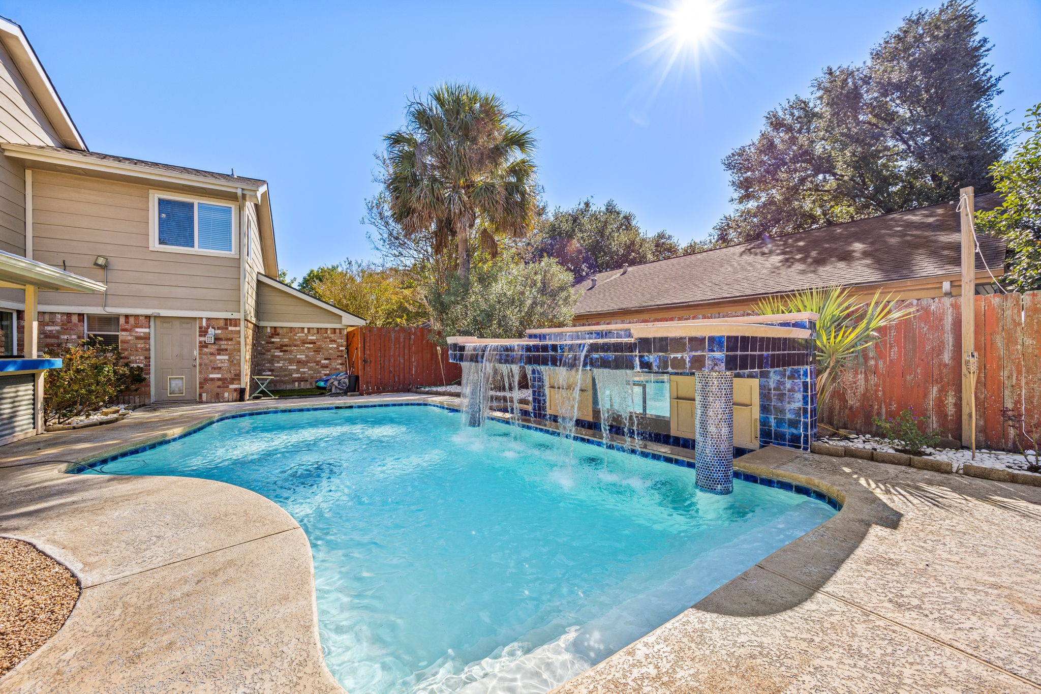 9907 Gold Cup Way Houston, TX 77065 - Photo 32 of 39 front view of a house with a yard