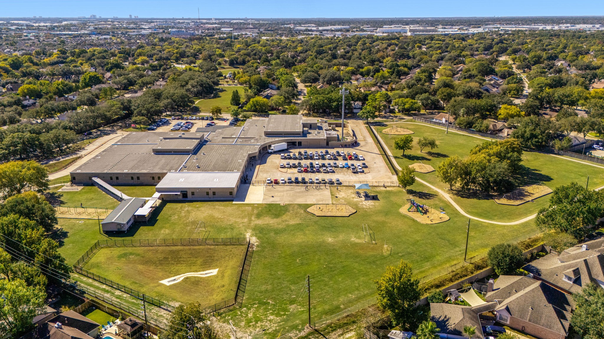 9907 Gold Cup Way Houston, TX 77065 - Photo 37 of 39 an aerial view of residential houses with outdoor space