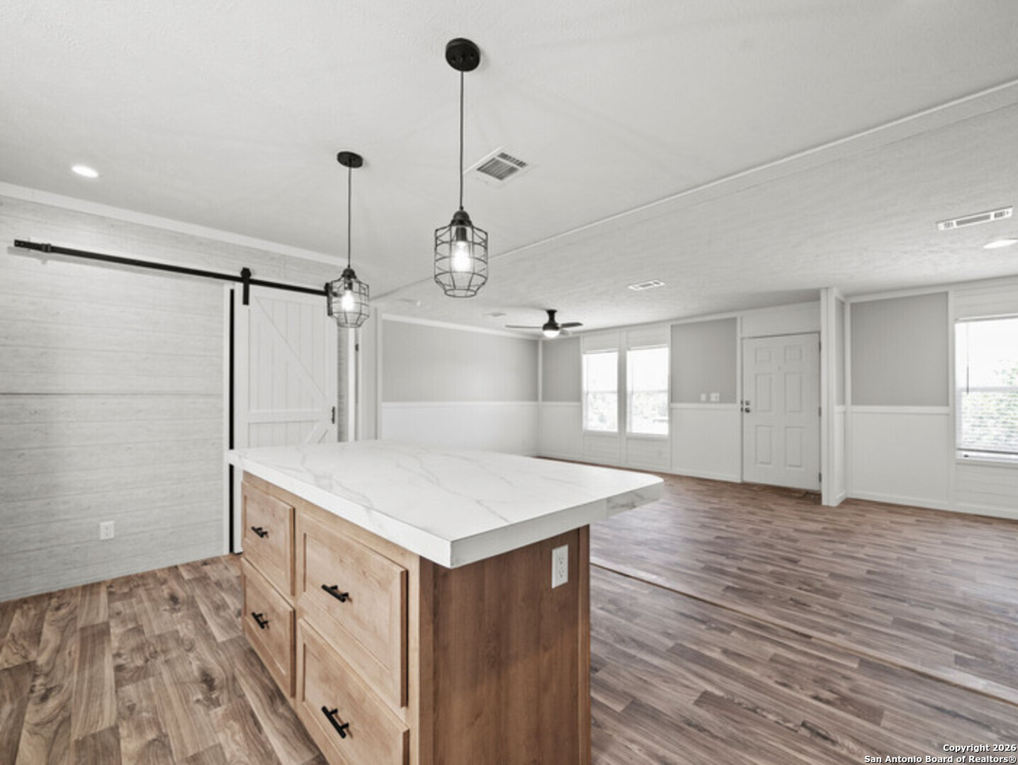 1144 Turkey Canyon Drive Spring Branch, TX 78070 - Photo 10 of 23 a very nice looking room with a wooden floor