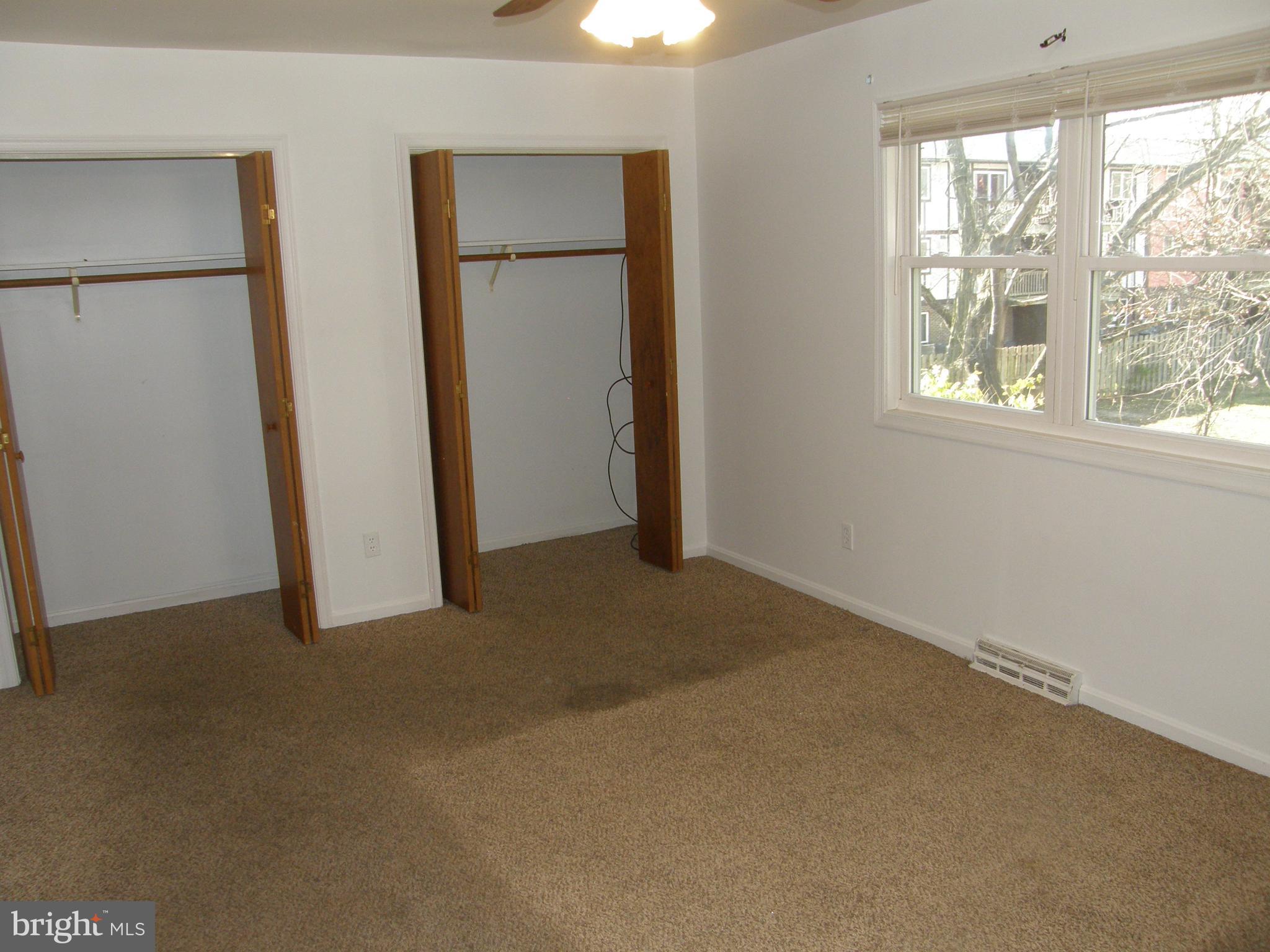 22087 Spring Valley Drive Lexington Park, MD 20653 - Photo 13 of 29 an empty room with windows and closet