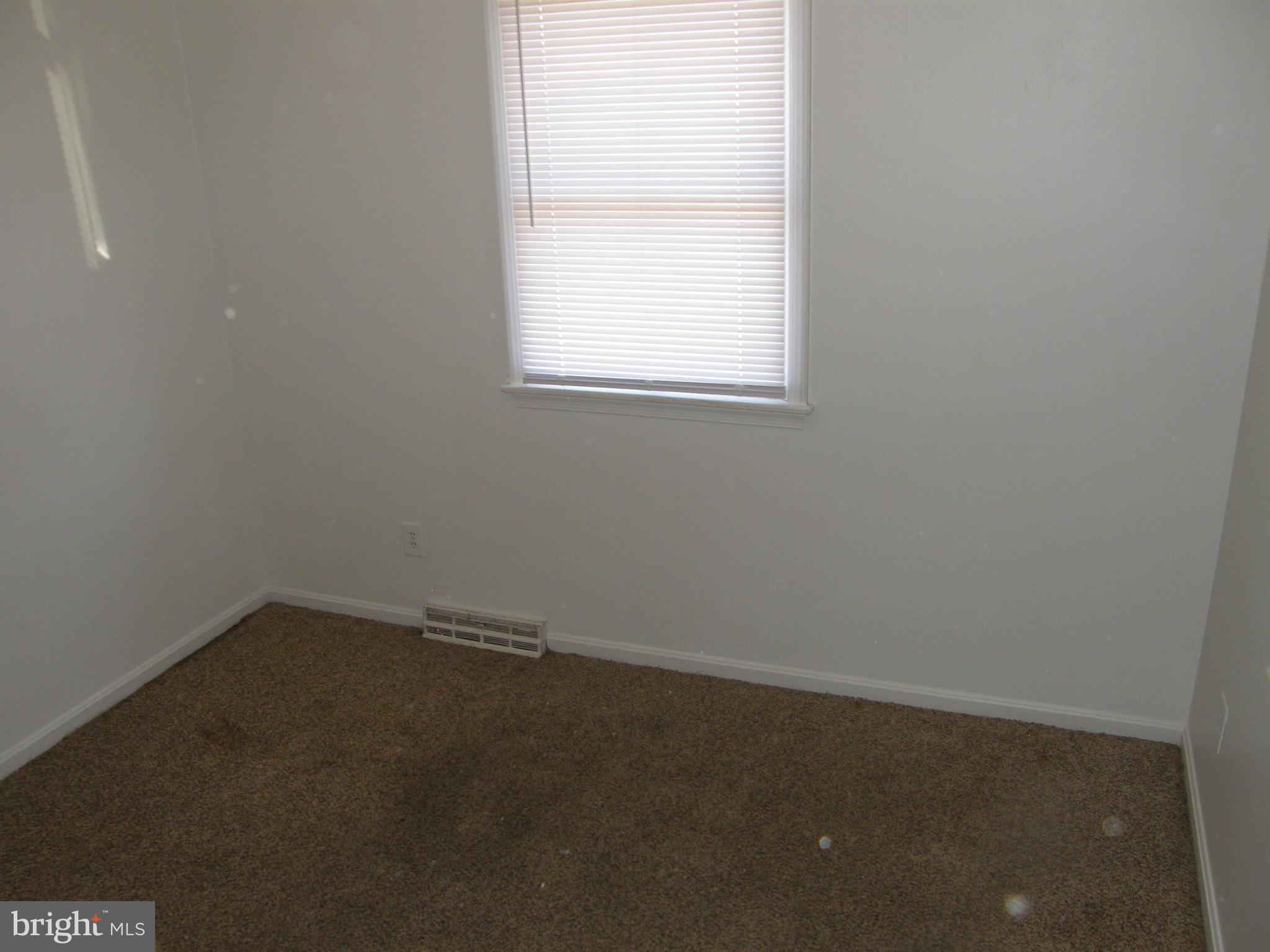 22087 Spring Valley Drive Lexington Park, MD 20653 - Photo 20 of 29 an empty room with a window