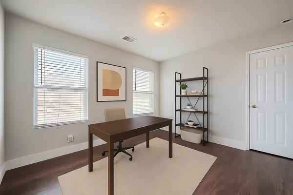 a workspace with wooden floor