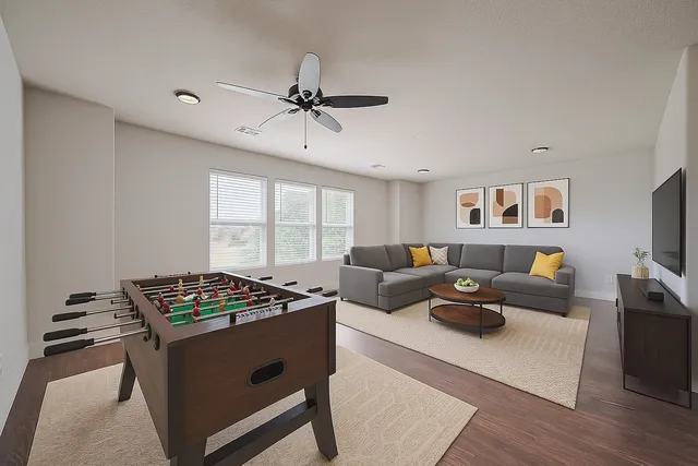 a living room with furniture and a window
