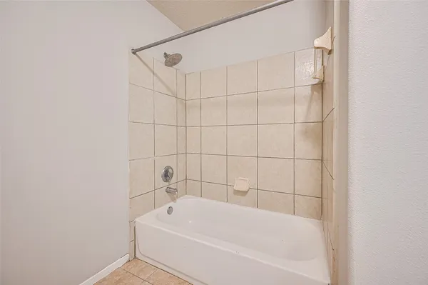 a bathroom with a bathtub