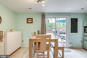 17 Devon Court Sterling, VA 20165 - Photo 8 of 30 a view of a dining room with furniture window and outside view