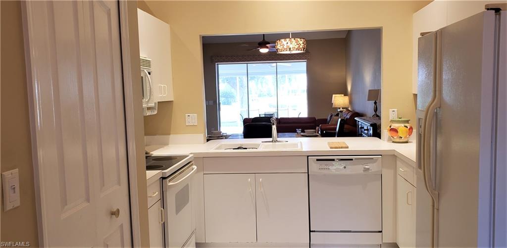 2258 Stacil Circle, Unit 1 Naples, FL 34109 - Photo 11 of 28 a view of washer and dryer