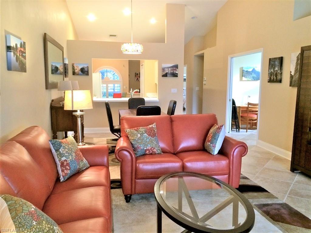 2258 Stacil Circle, Unit 1 Naples, FL 34109 - Photo 7 of 28 a view of a livingroom with furniture and a couch