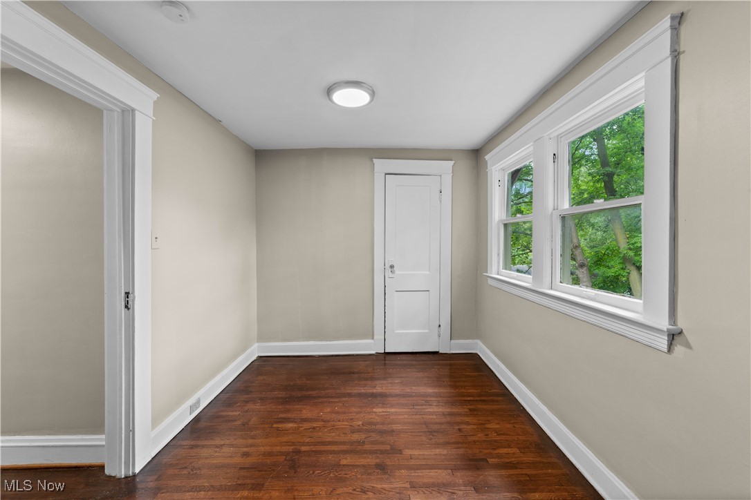 3165 Oak Road Cleveland, OH 44118 - Photo 27 of 30 Spare room featuring dark wood-type flooring and baseboards