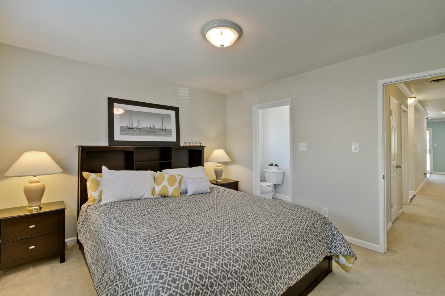 1101 Kenwal Road Concord, CA 94521 - Photo 12 of 20 a bedroom with a bed and lamps