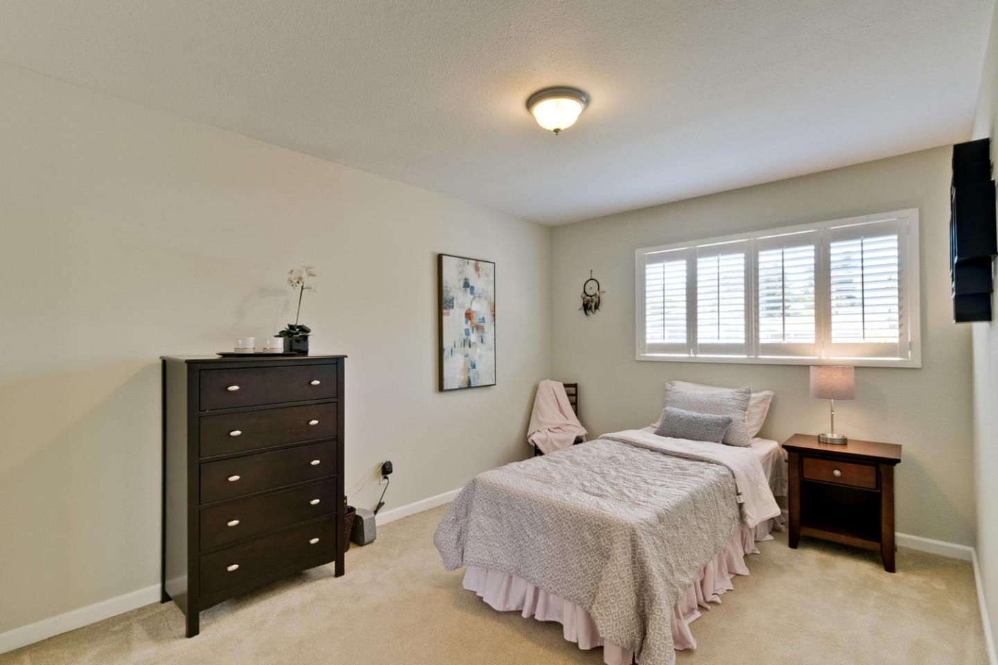 1101 Kenwal Road Concord, CA 94521 - Photo 13 of 20 a bedroom with a bed and a closet