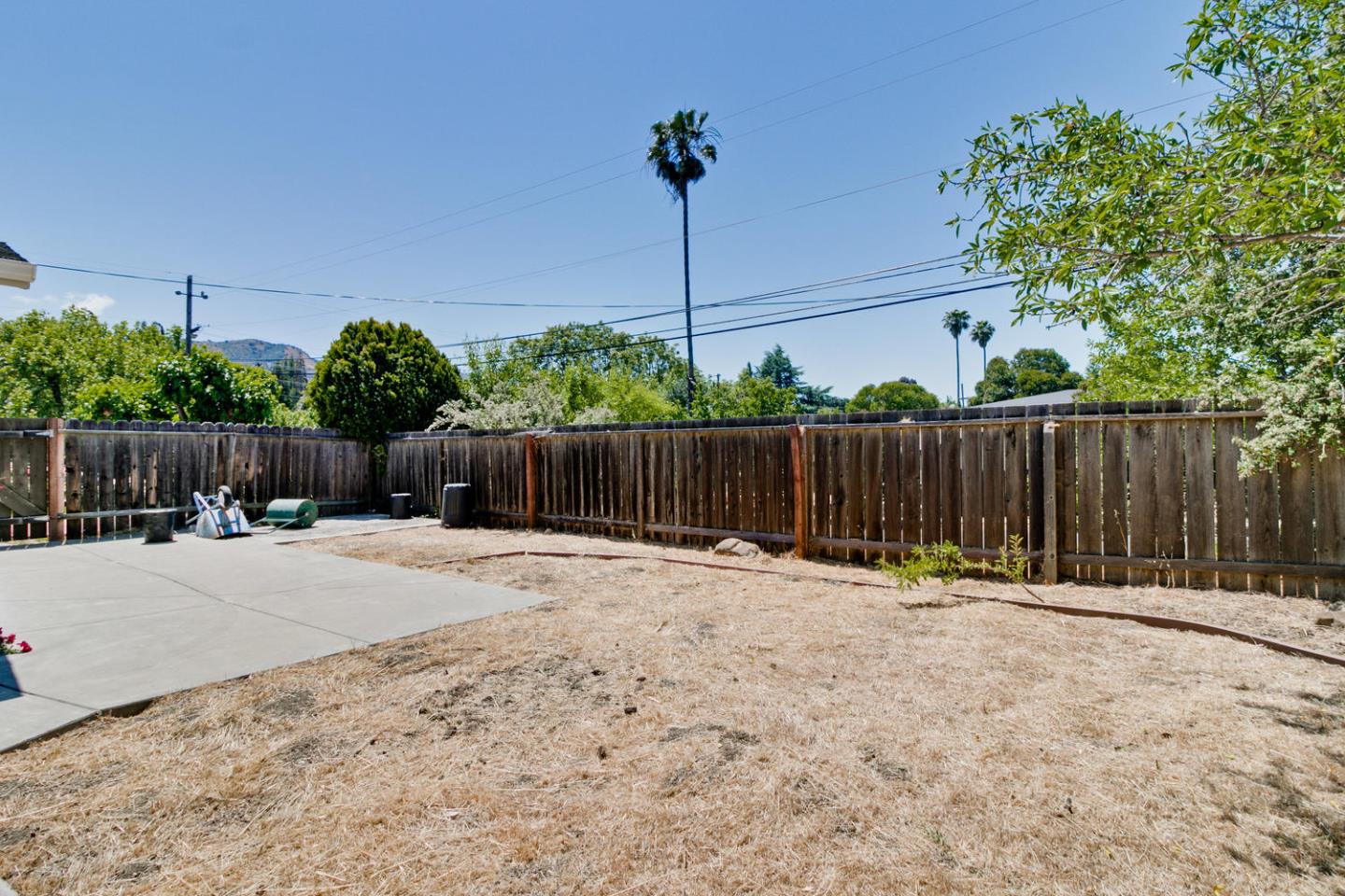 1101 Kenwal Road Concord, CA 94521 - Photo 16 of 20 a backyard with a fence and a fence