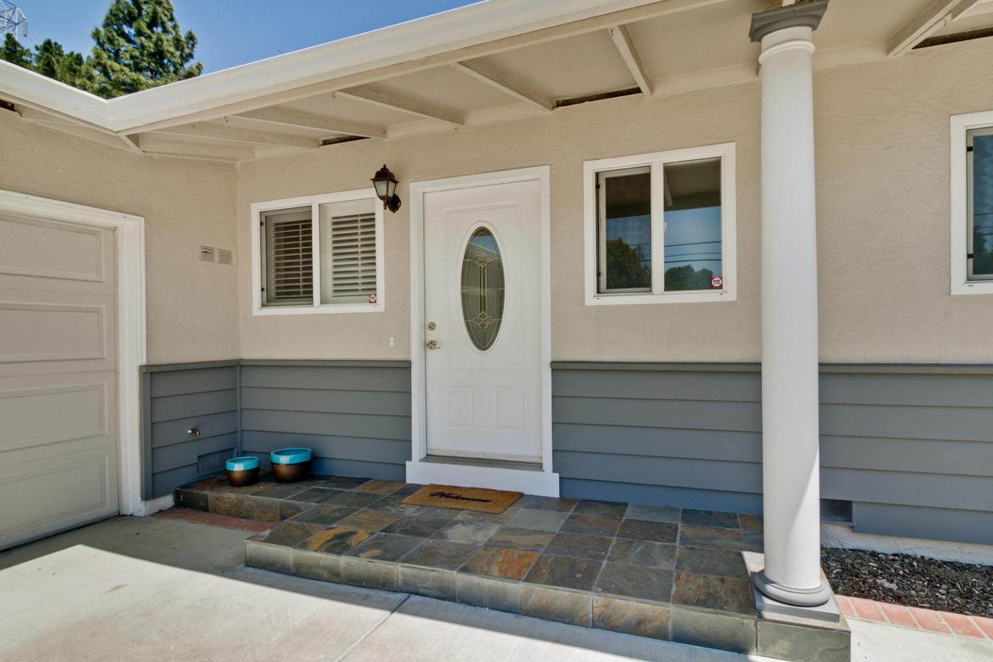 1101 Kenwal Road Concord, CA 94521 - Photo 3 of 20 a front view of a house with garage