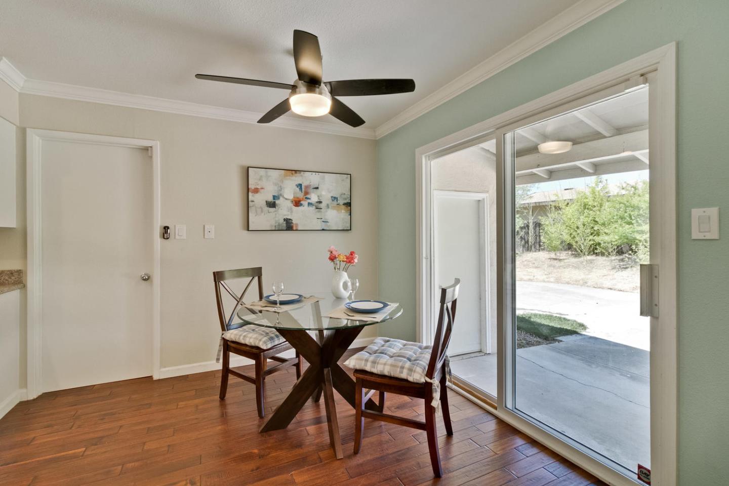 1101 Kenwal Road Concord, CA 94521 - Photo 7 of 20 a view of a dining room with furniture window and wooden floor