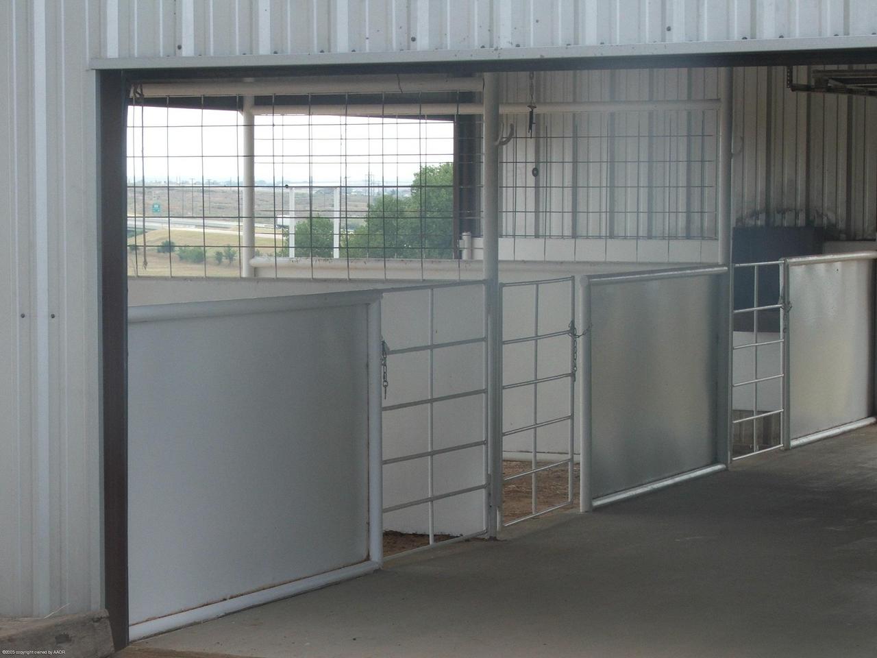 6301 West Country Club Road Canyon, TX 79015 - Photo 12 of 13 Barn inside
