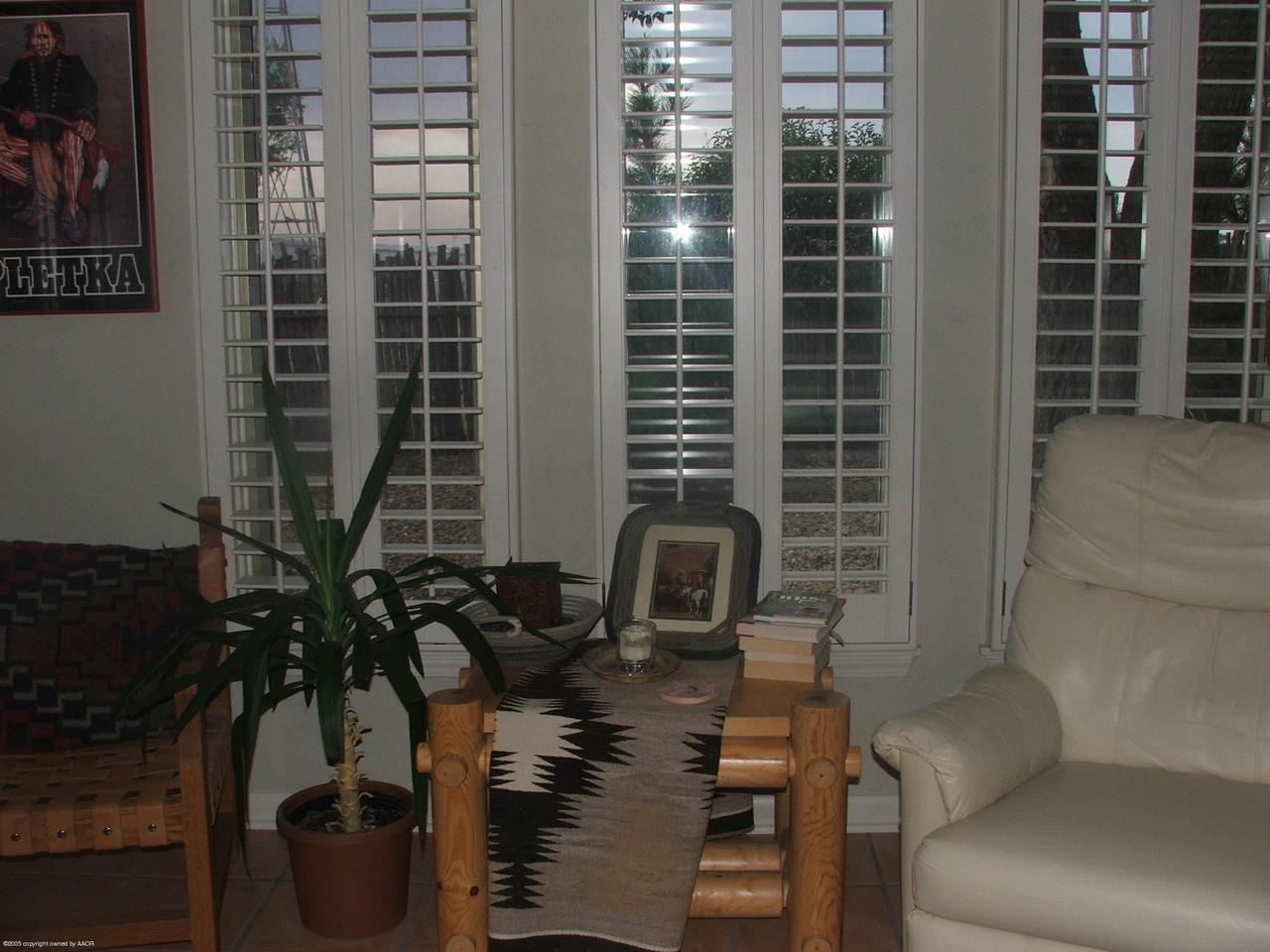 6301 West Country Club Road Canyon, TX 79015 - Photo 10 of 13 Sitting Area Master Bedroom