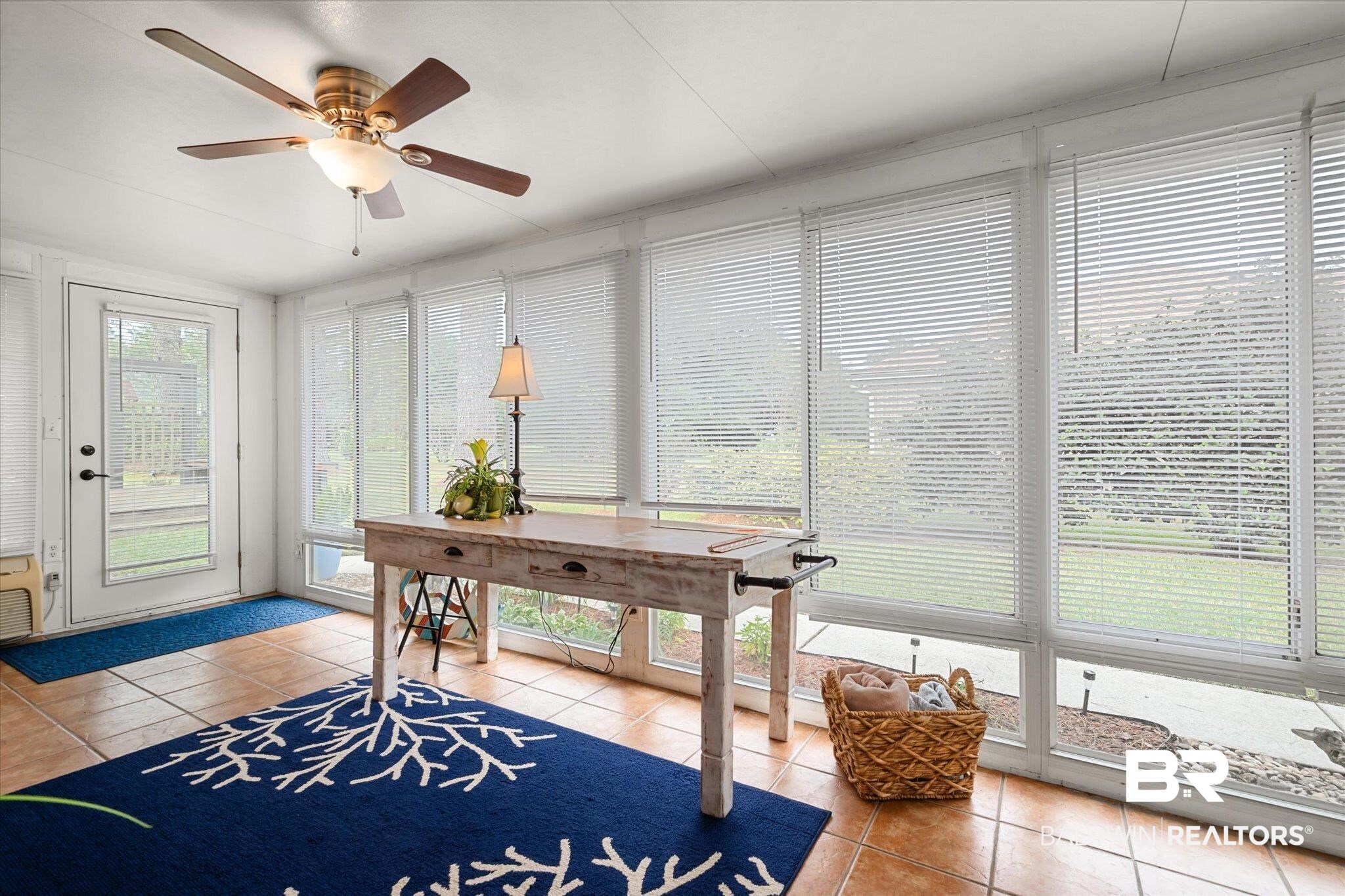 19924 Hunters Loop Fairhope, AL 36532 - Photo 16 of 40 Office with tile patterned flooring, ceiling fan, and a healthy amount of sunlight