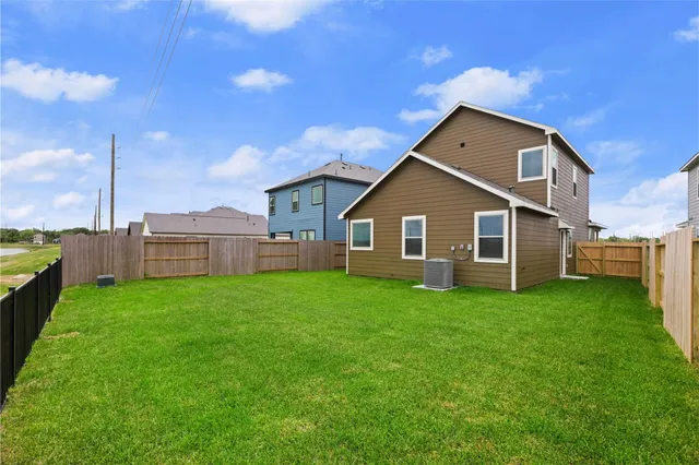 a view of a backyard of the house