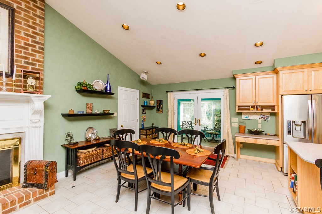8485 Stumpy Road Hanover, VA 23069 - Photo 15 of 50 a living room with furniture a flat screen tv and a refrigerator