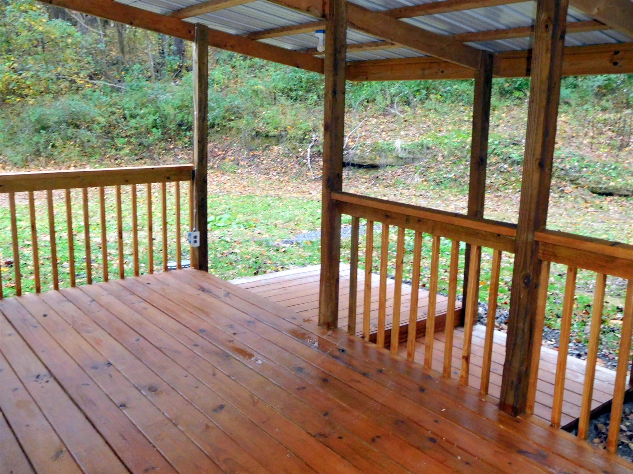 1032 Kaity Brooke Road Portland, TN 37148 - Photo 18 of 23 Notice the view and metal roof. Enjoy the sound of soft rain on a peaceful day.