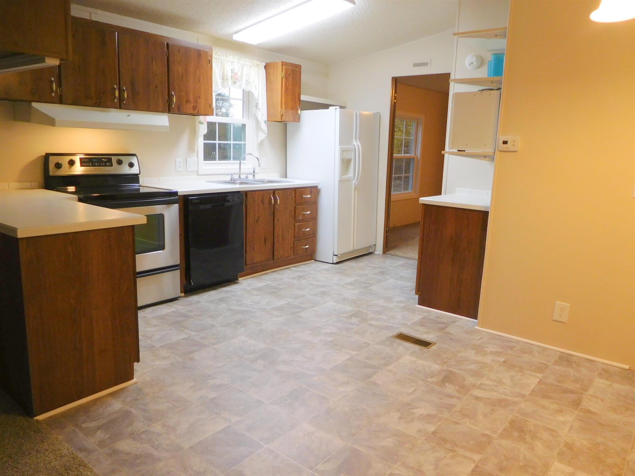 1032 Kaity Brooke Road Portland, TN 37148 - Photo 3 of 23 Kitchen also offers extra cabinets and pantry