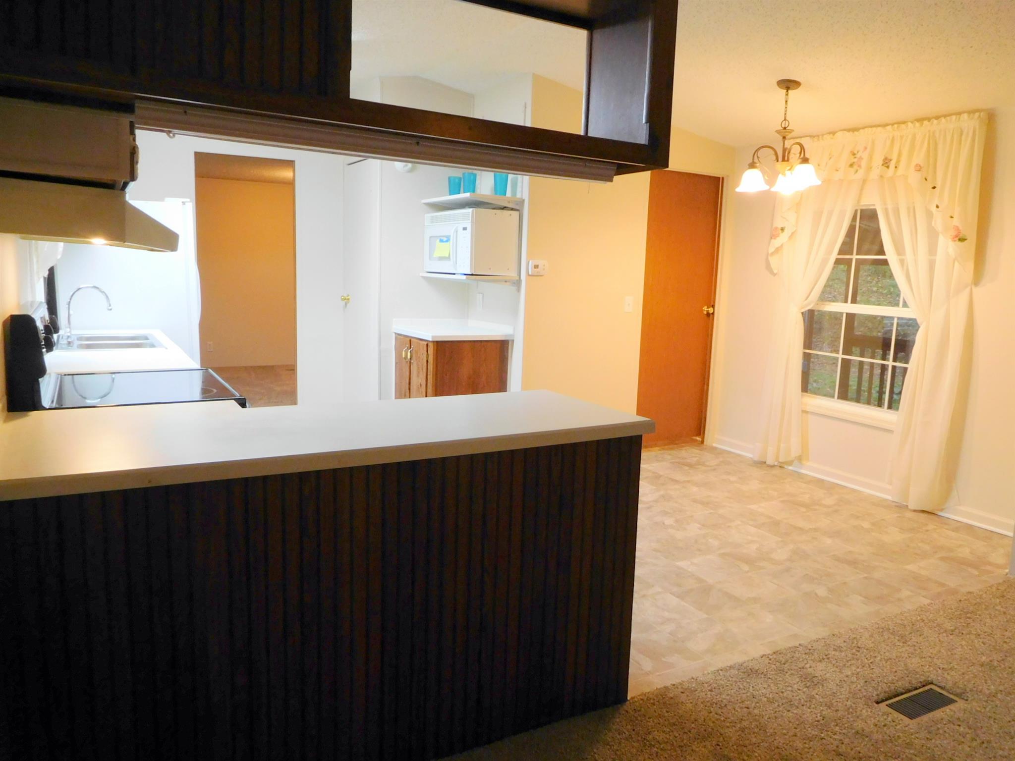 1032 Kaity Brooke Road Portland, TN 37148 - Photo 5 of 23 View of kitchen - door leads to separate laundry room.