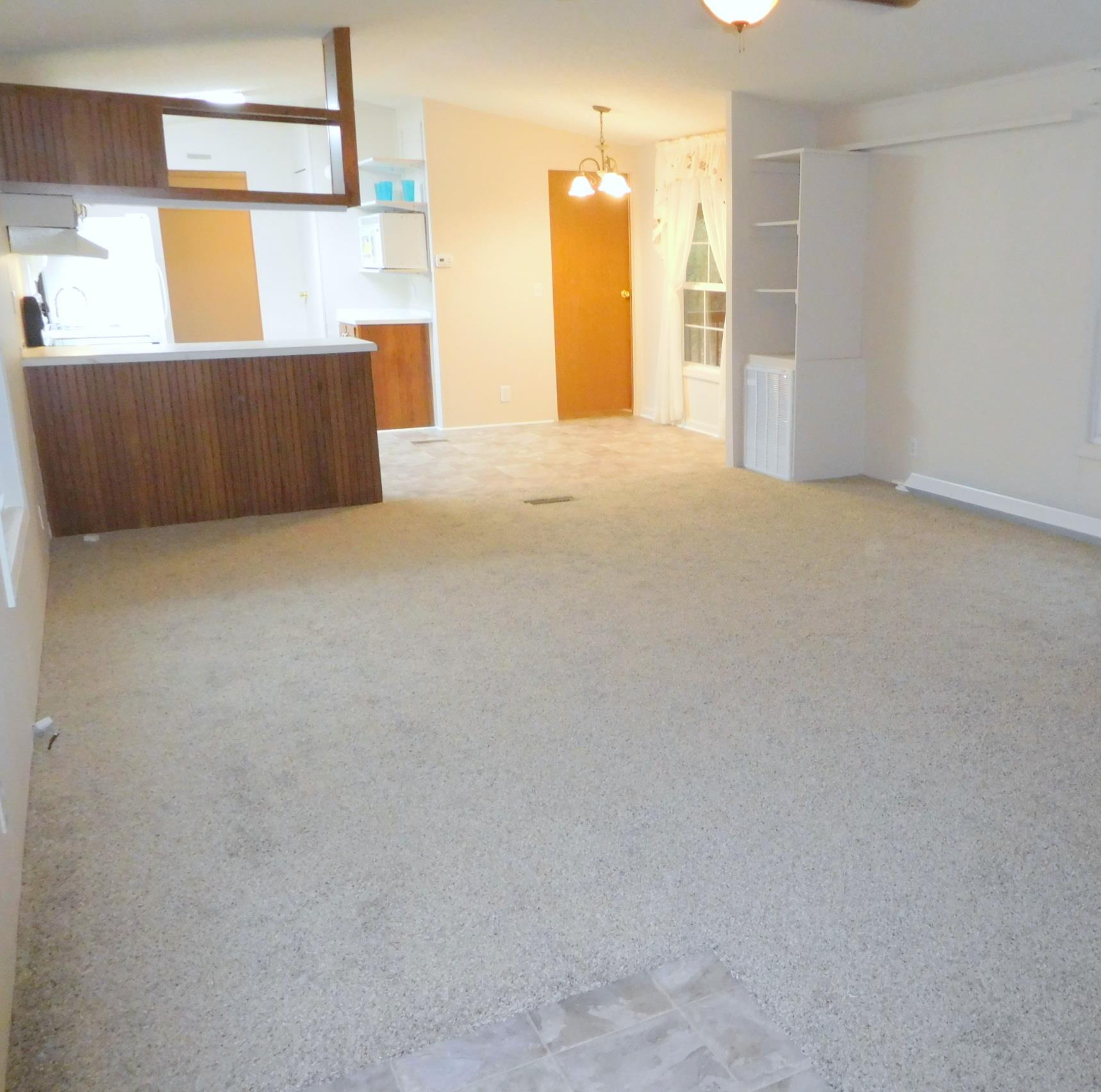 1032 Kaity Brooke Road Portland, TN 37148 - Photo 7 of 23 Large living room open to kitchen for great living space.
