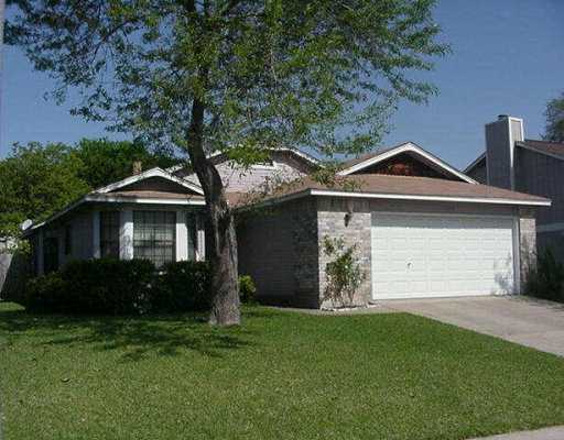 11916 Snow Finch Road Austin, TX 78758 - Photo 1 of 1 a front view of a house with a garden