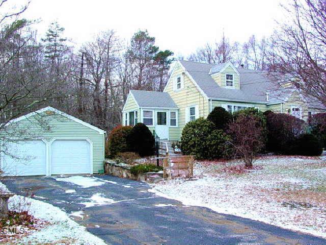 55 Tanglewood Road Trumbull, CT 06611 - Photo 1 of 1 a view of a house with backyard and sitting area