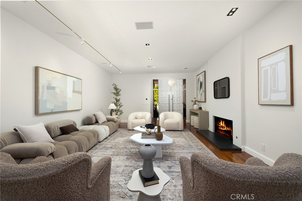 598 Camillo Road Sierra Madre, CA 91024 - Photo 13 of 75 a living room with fireplace furniture and a fireplace