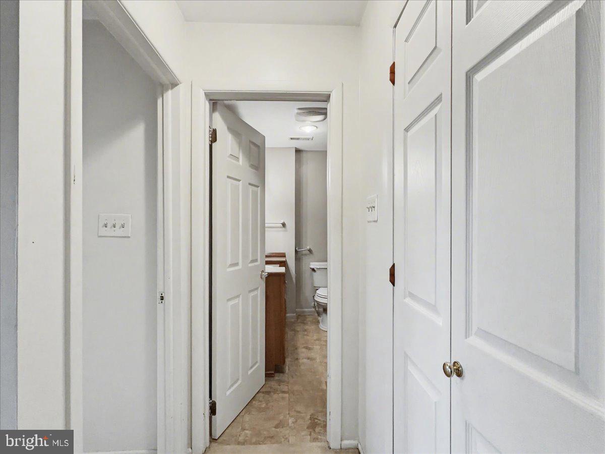 1575 Creekside Road, Unit A21 Whitehall, PA 18052 - Photo 14 of 21 a view of a bathroom from a hallway
