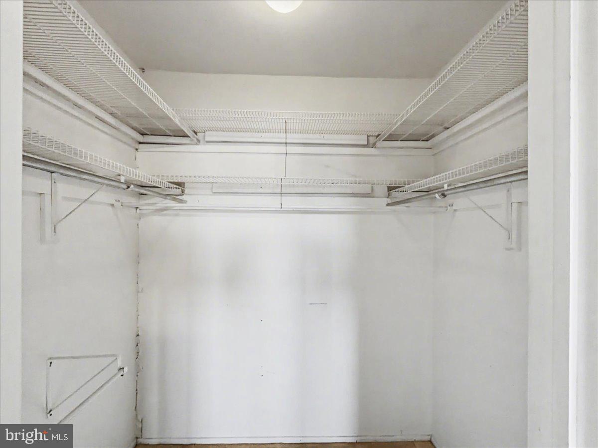 1575 Creekside Road, Unit A21 Whitehall, PA 18052 - Photo 15 of 21 a view of a room with racks on the wall