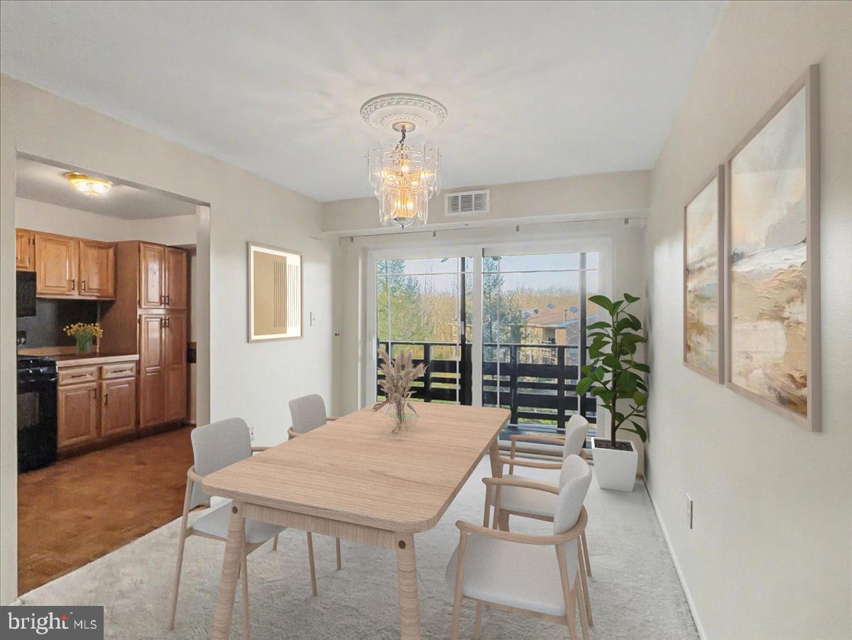 1575 Creekside Road, Unit A21 Whitehall, PA 18052 - Photo 3 of 21 a dining room with a table chairs and entryway