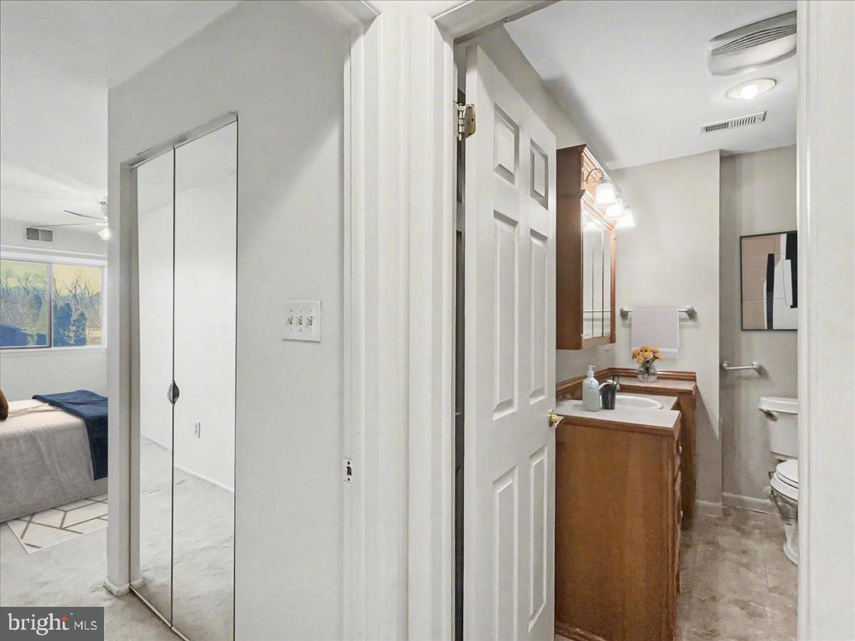 1575 Creekside Road, Unit A21 Whitehall, PA 18052 - Photo 6 of 21 a kitchen with stainless steel appliances granite countertop a refrigerator and a stove