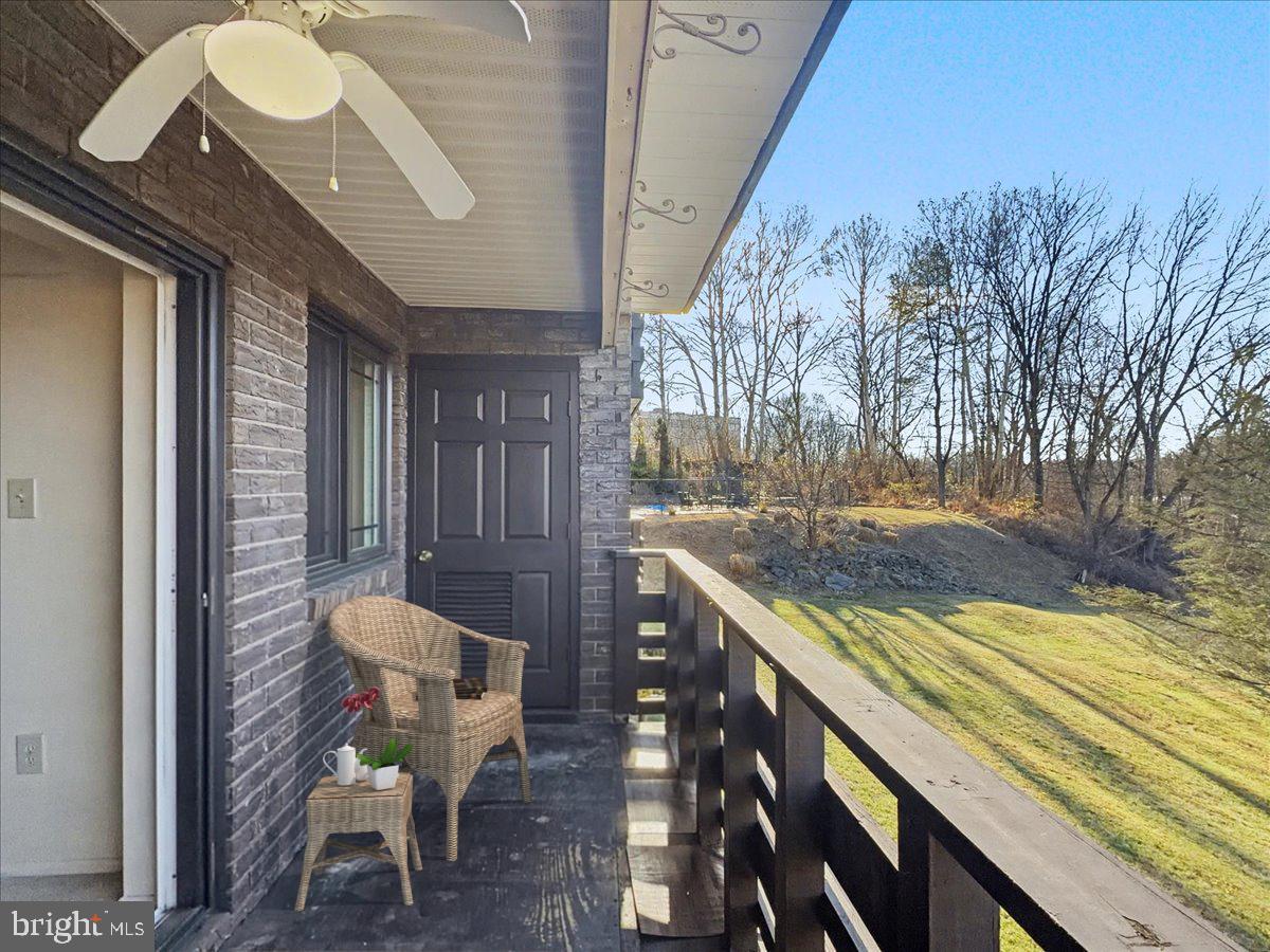 1575 Creekside Road, Unit A21 Whitehall, PA 18052 - Photo 8 of 21 a view of a balcony with chairs