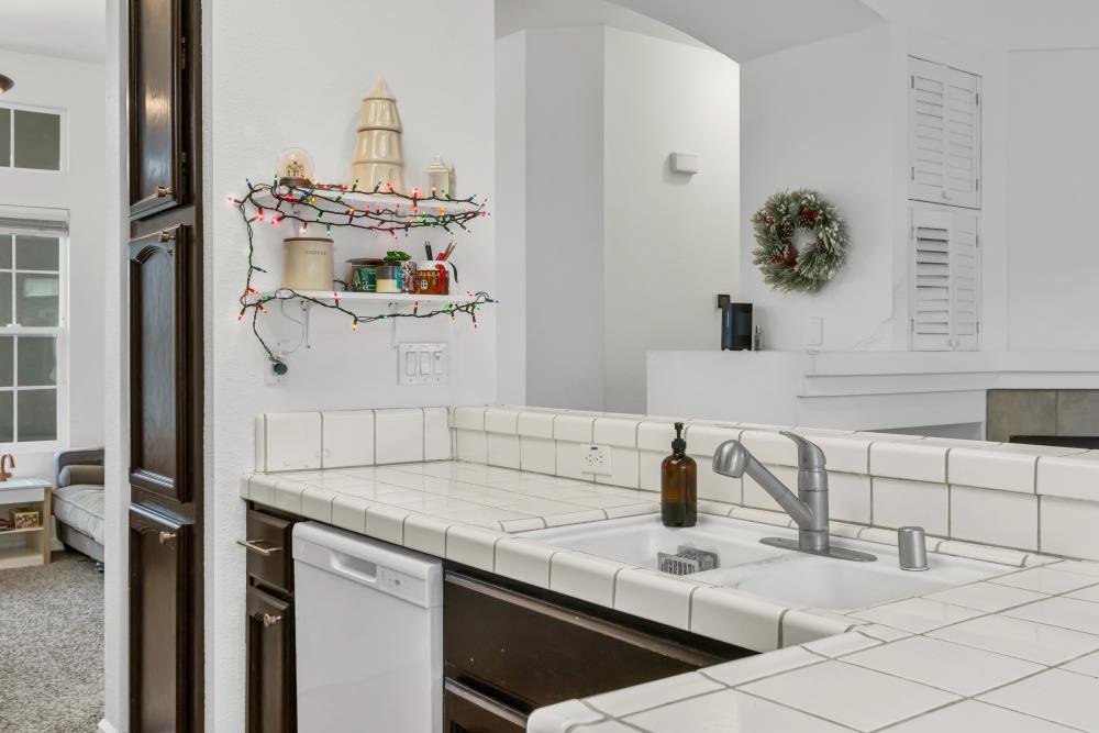 8679 Spring House Way Elk Grove, CA 95624 - Photo 19 of 48 a bathroom with a sink and a mirror