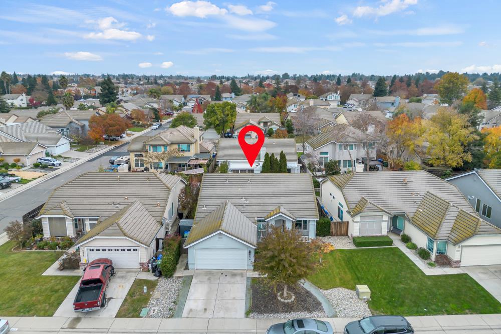 8679 Spring House Way Elk Grove, CA 95624 - Photo 42 of 48 a view of multiple houses with a city