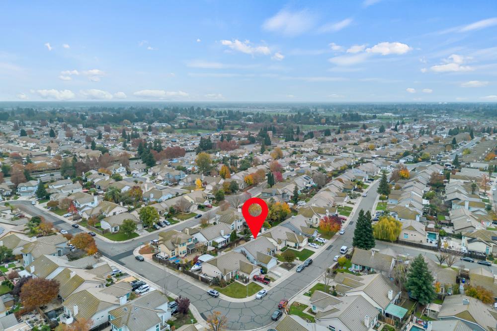 8679 Spring House Way Elk Grove, CA 95624 - Photo 45 of 48 an aerial view of residential houses with outdoor space