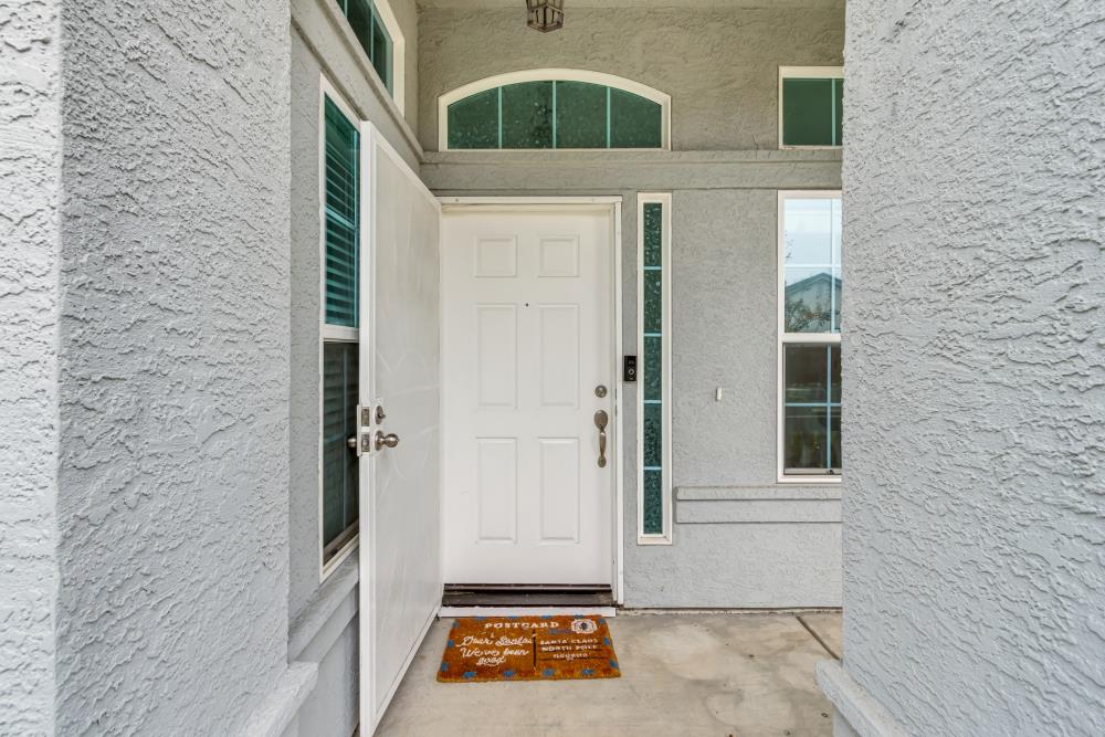 8679 Spring House Way Elk Grove, CA 95624 - Photo 5 of 48 a view of a door of the house
