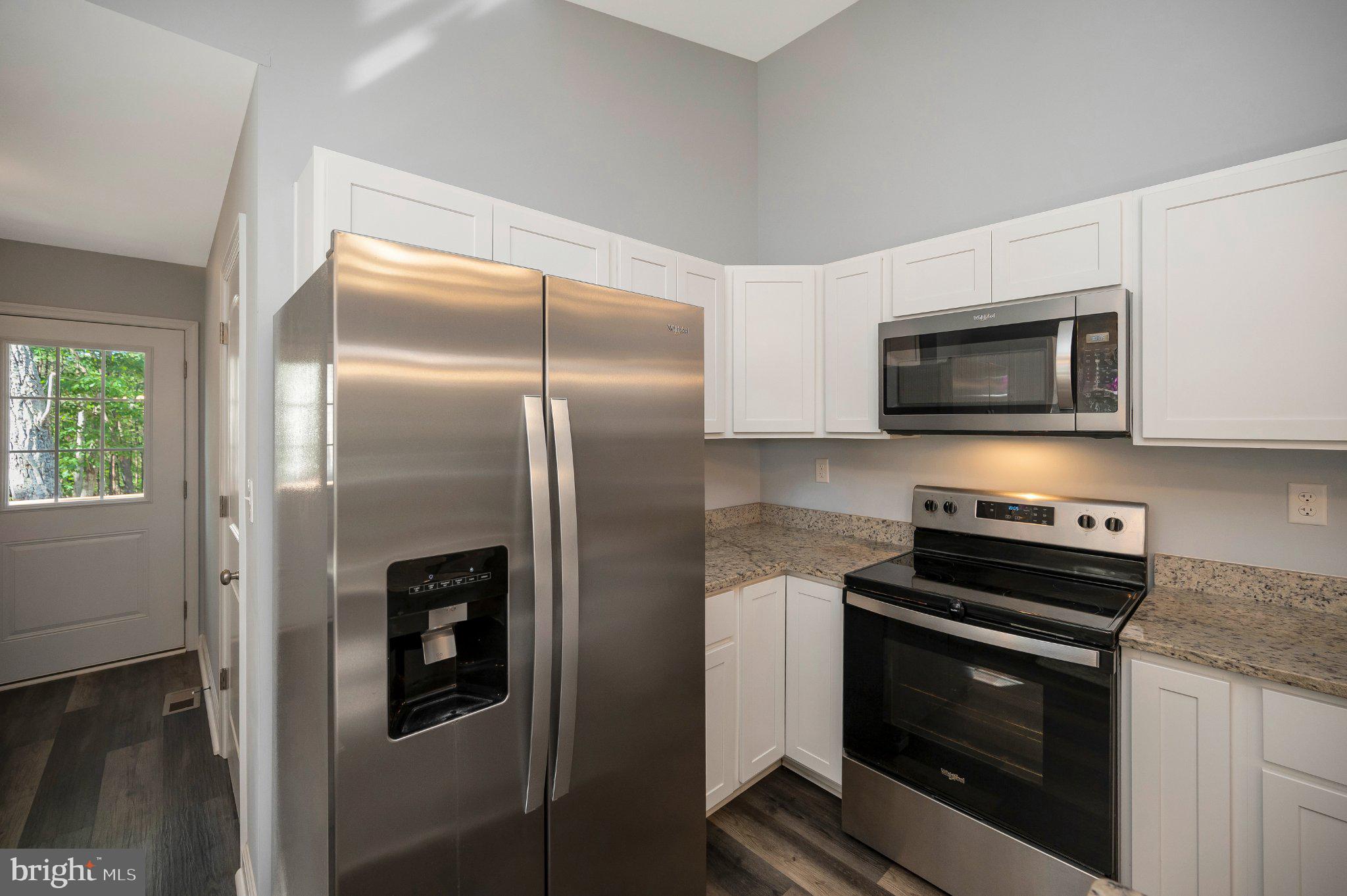 28282 Tatum Road Unionville, VA 22567 - Photo 19 of 52 Modern kitchen with sleek appliances.